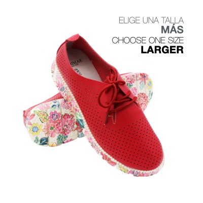 Baskets en cuir ajouré avec semelle à motif floral