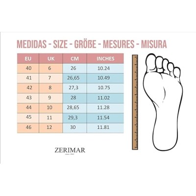 Mocassins homme à pompons et semelle cuir